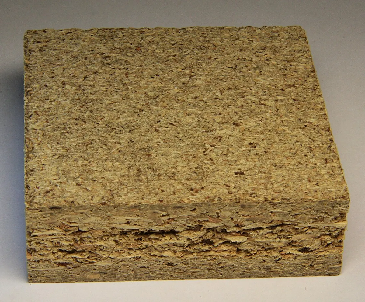 Piece of particle board showing its pressed wood chips