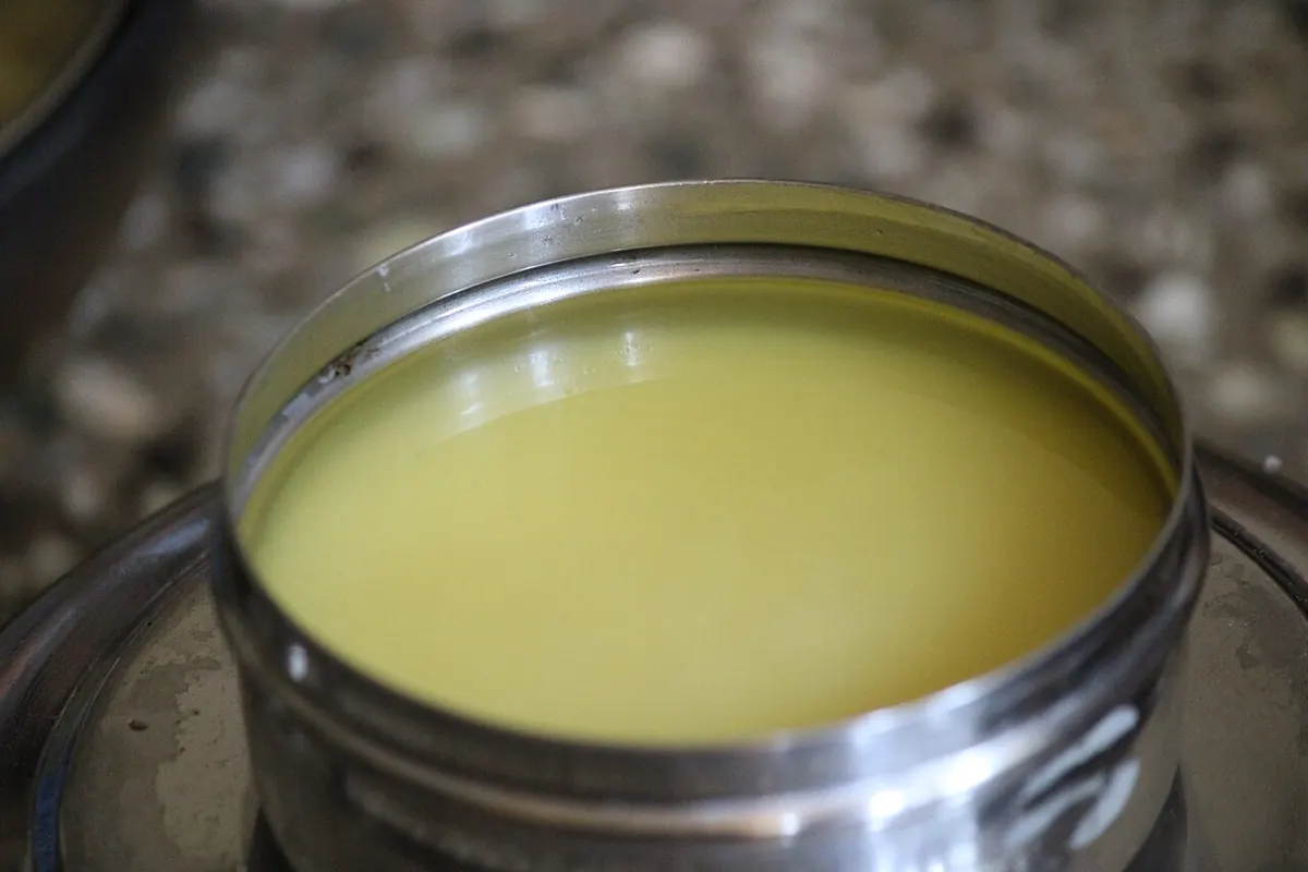 Golden ghee in a steel container