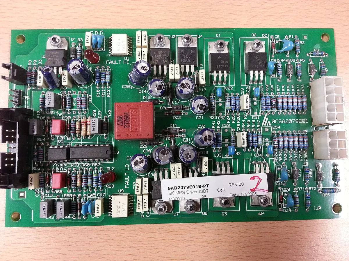 Green printed circuit board with capacitors and power transistors