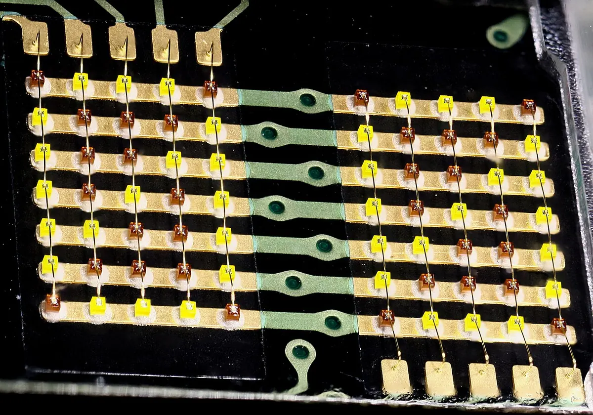 Close view of tiny LED chips wired in a dot matrix