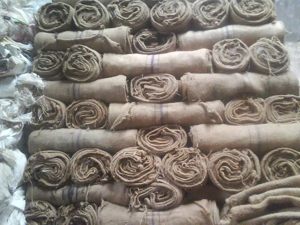 Stacked rolls of jute sacking bags