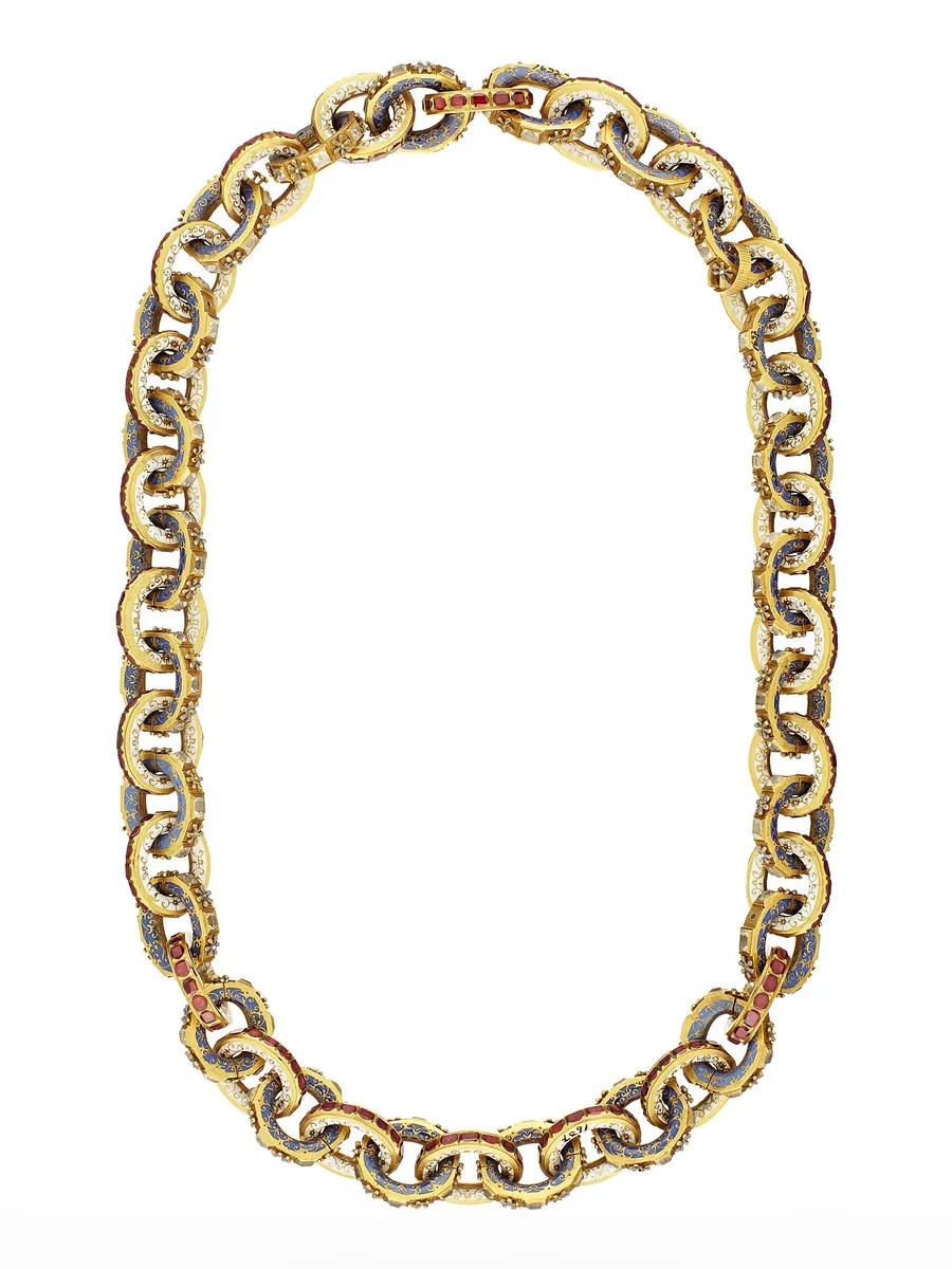 Ornate gold chain necklace with enamel and small gemstones