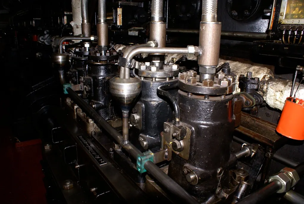 Diesel engine and pipework in a ship engine room