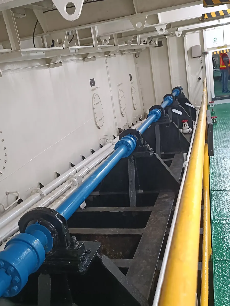 Propeller shaft running through a ship engine room