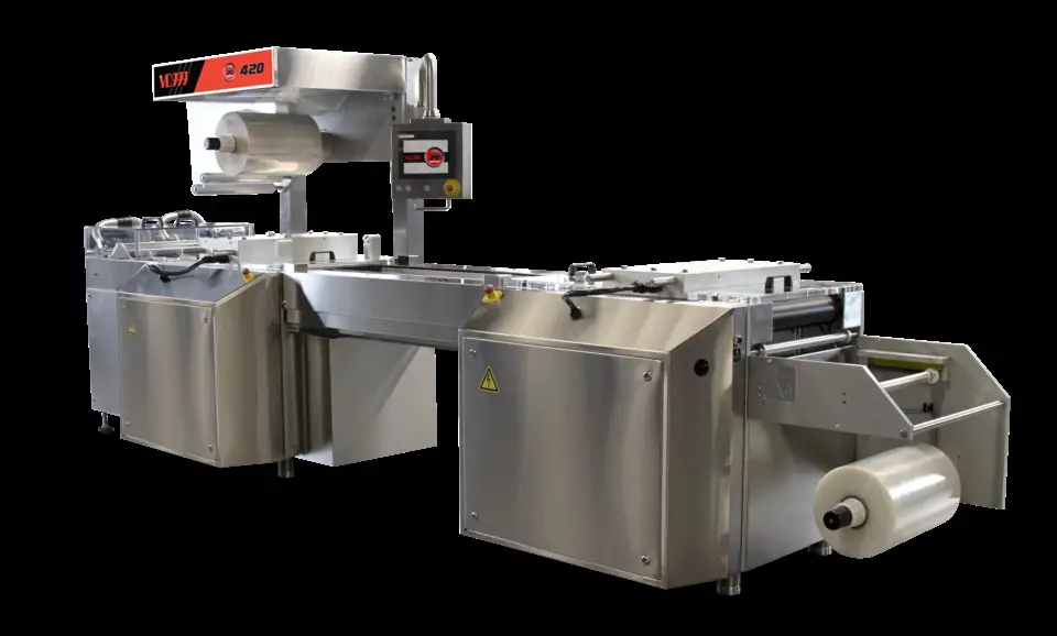 R-Series Right Front thermoforming roll stock vacuum MAP and skin packaging machine by VC9