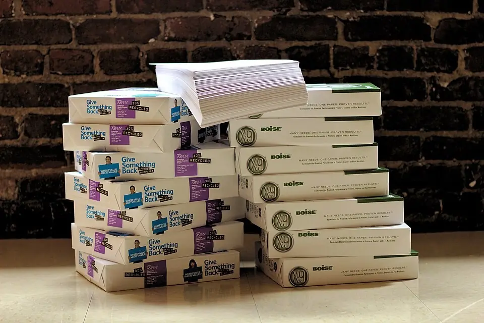 reams of paper stacked on the floor