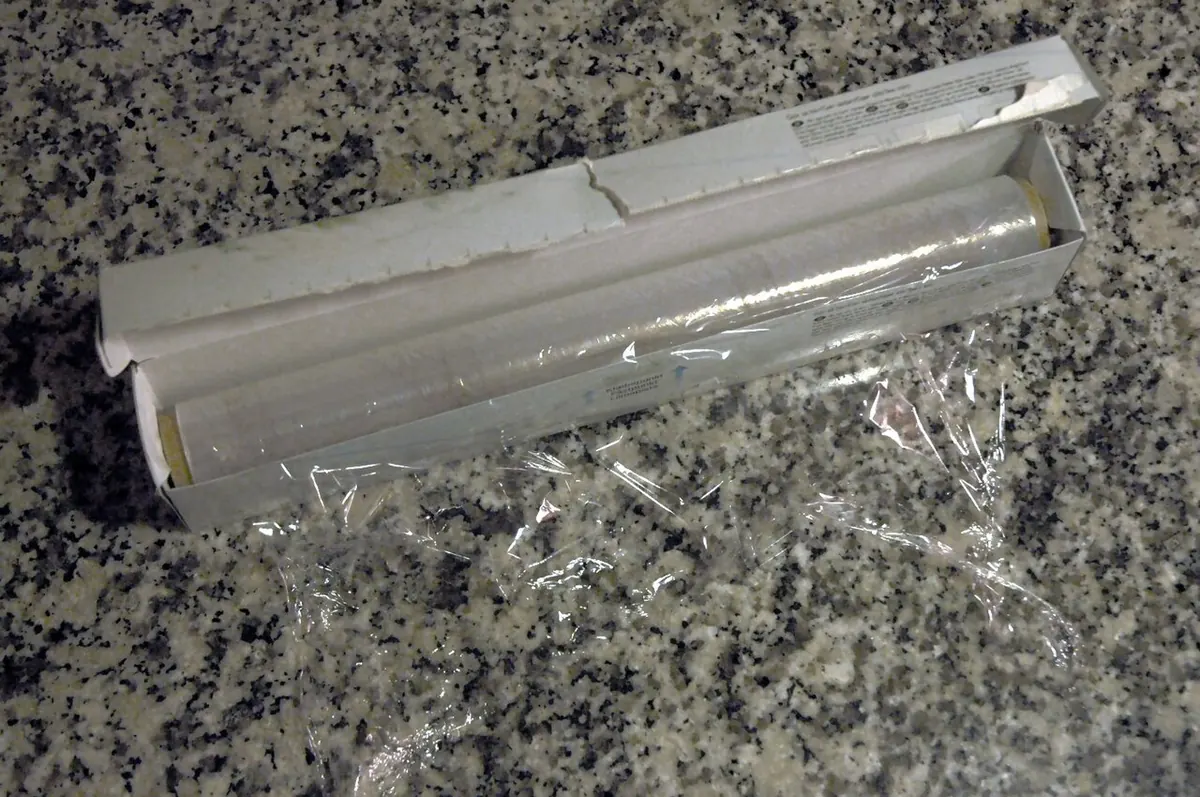 Roll of clear cling film in its box