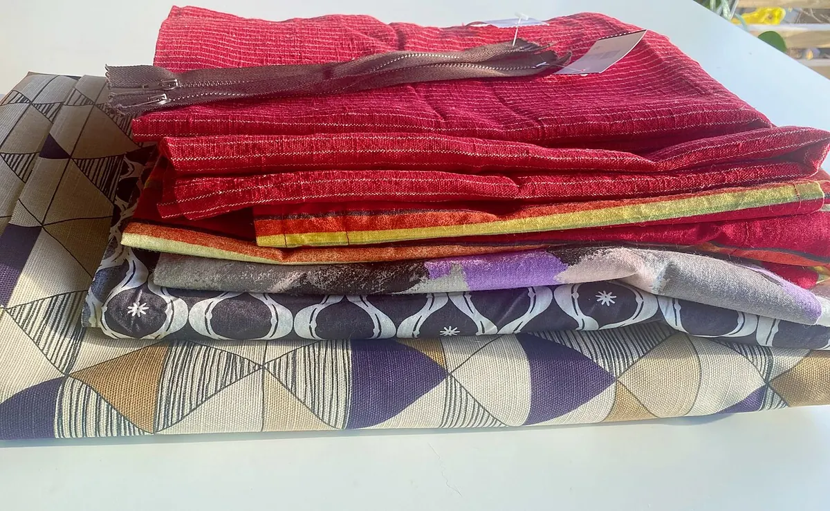 Folded fabric scraps in mixed colours and patterns